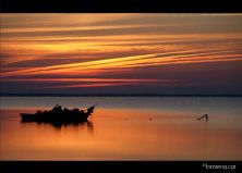 surt el sol des de lembarcador de la magdalena delta de lebre.jpg